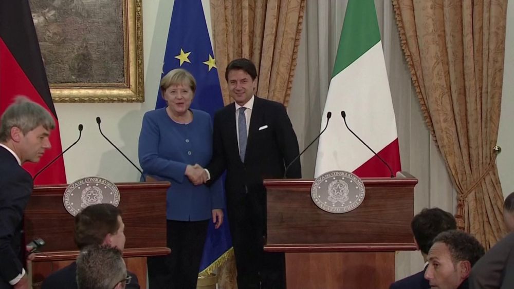 A menekültek tagállamok közötti szétosztását sürgeti Merkel és Conte 